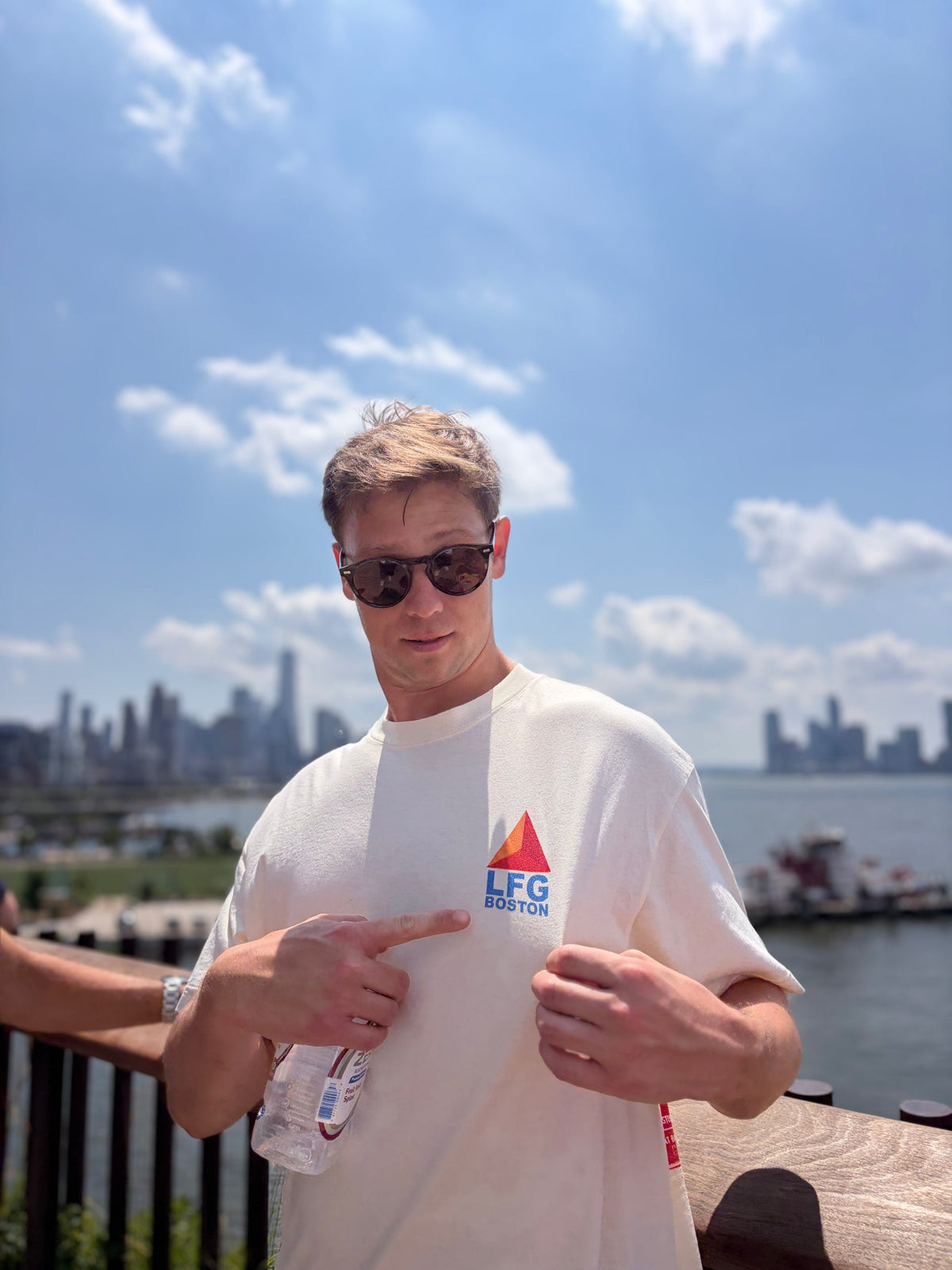fan on the harbor wearing the lfg red citgo tee, front
