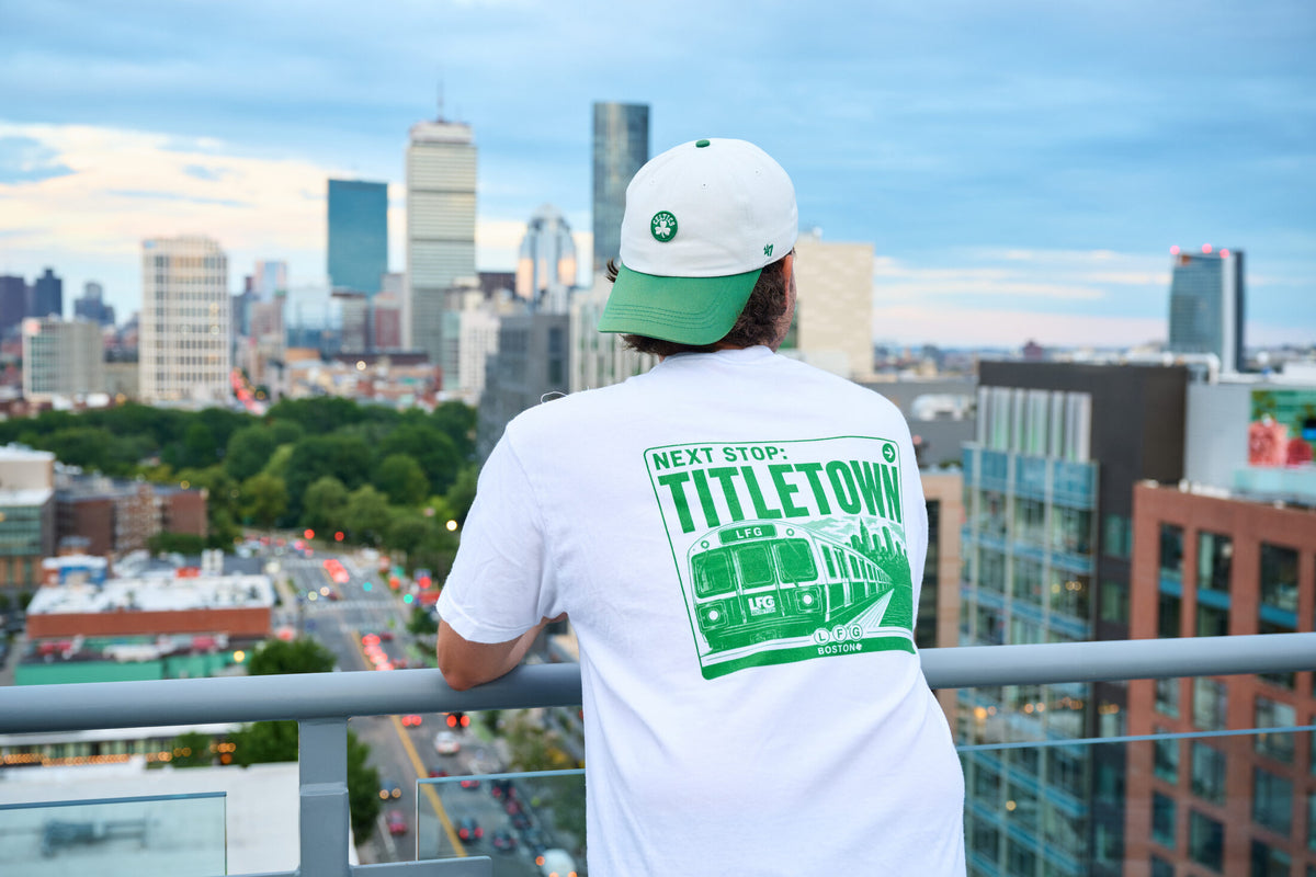 fan in the lfg greenline pocket tee, next stop titletown back print, overlooking boston