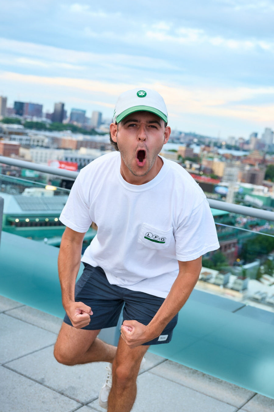 fan fist pumping in the lfg greenline pocket tee